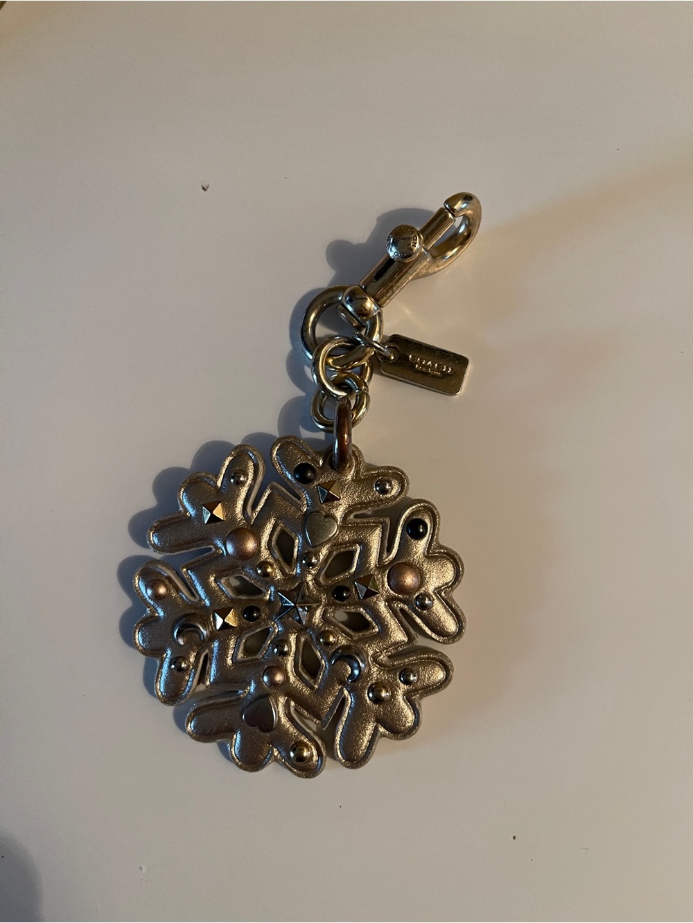 Coach Snowflake Star Dust Bag Charm